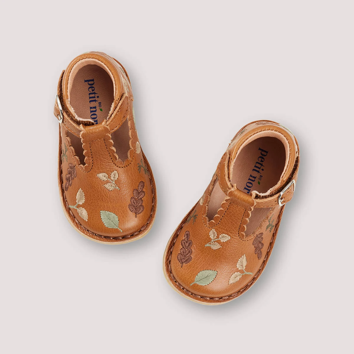 Uniqua Autumn Leaves Scallop T Bar Starter Shoes In Cognac By Petit Nord