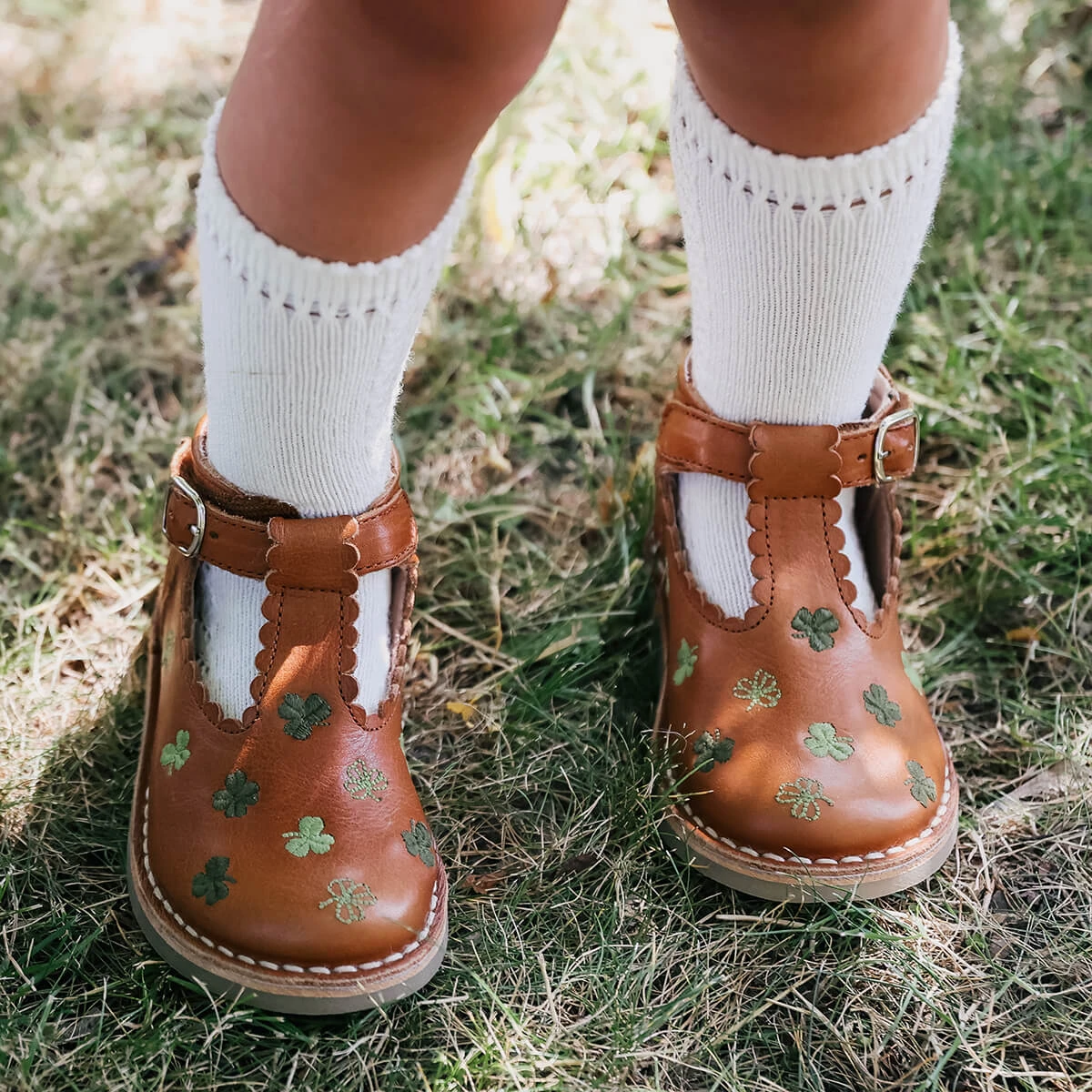 Uniqua Clover Scallop T Bar Starter Shoes In Cognac By Petit Nord - Image 15